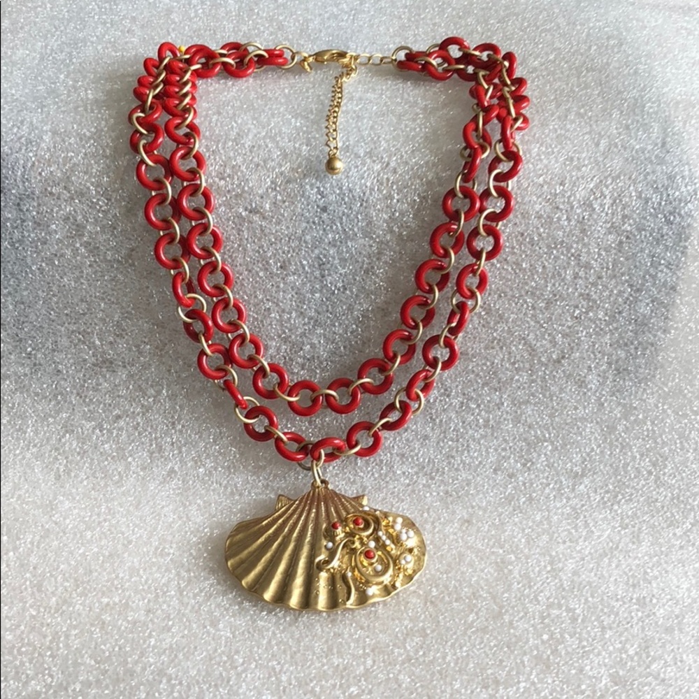 Red link and gold seashell necklace